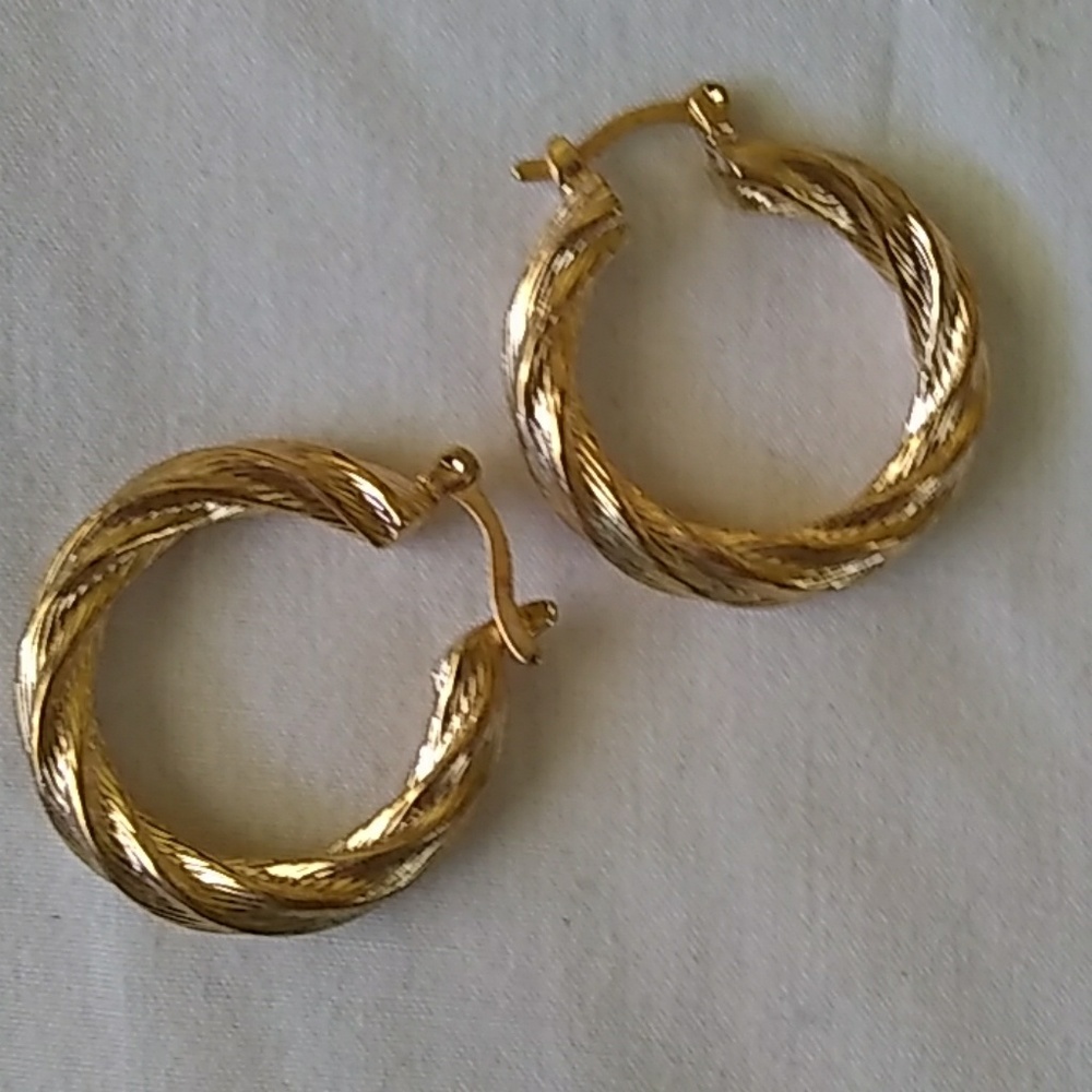 Classic gold hoops with a twist!